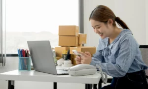 Woman using laptop on table