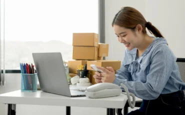 Woman using laptop on table